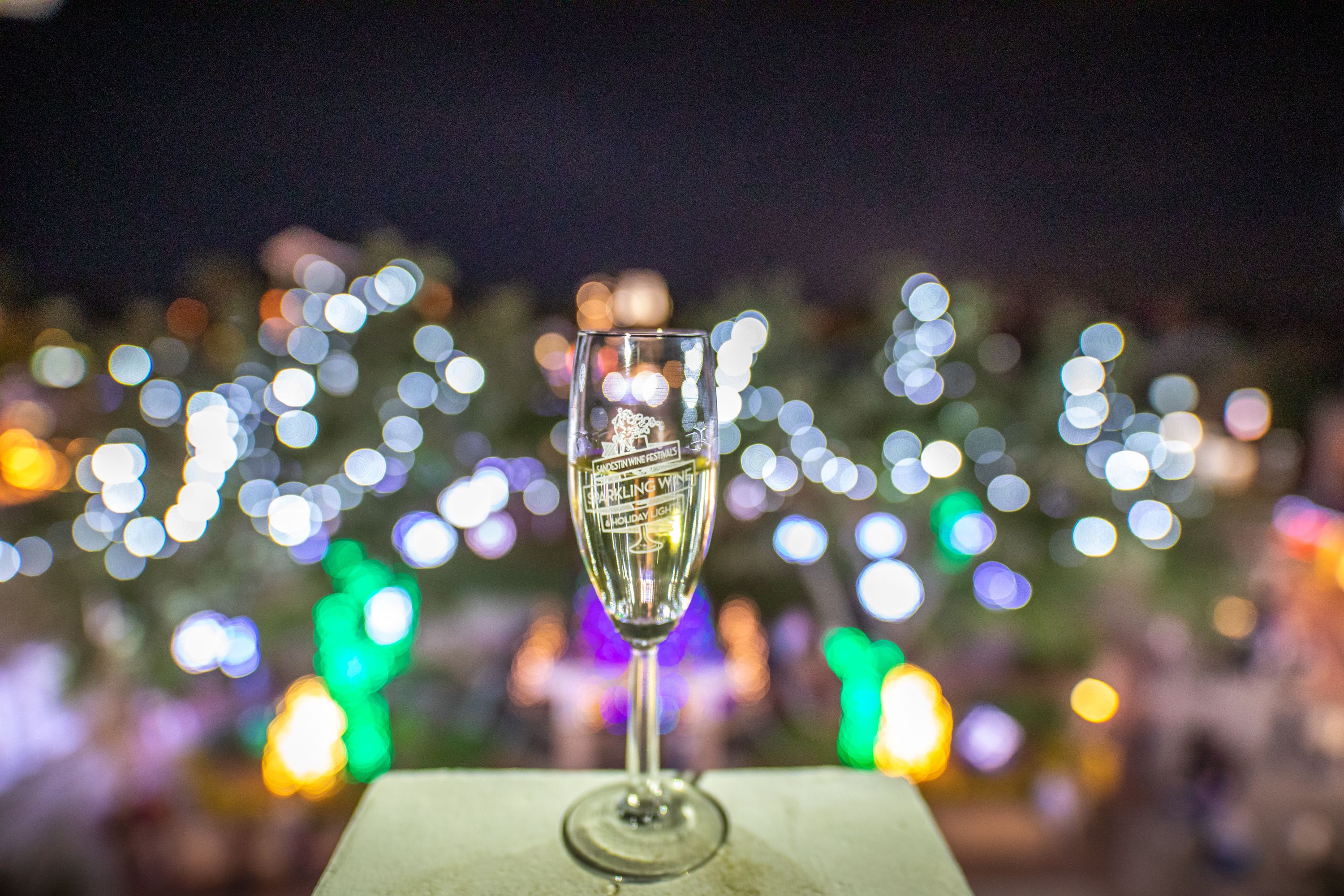 Sparkling Wine and holiday lights